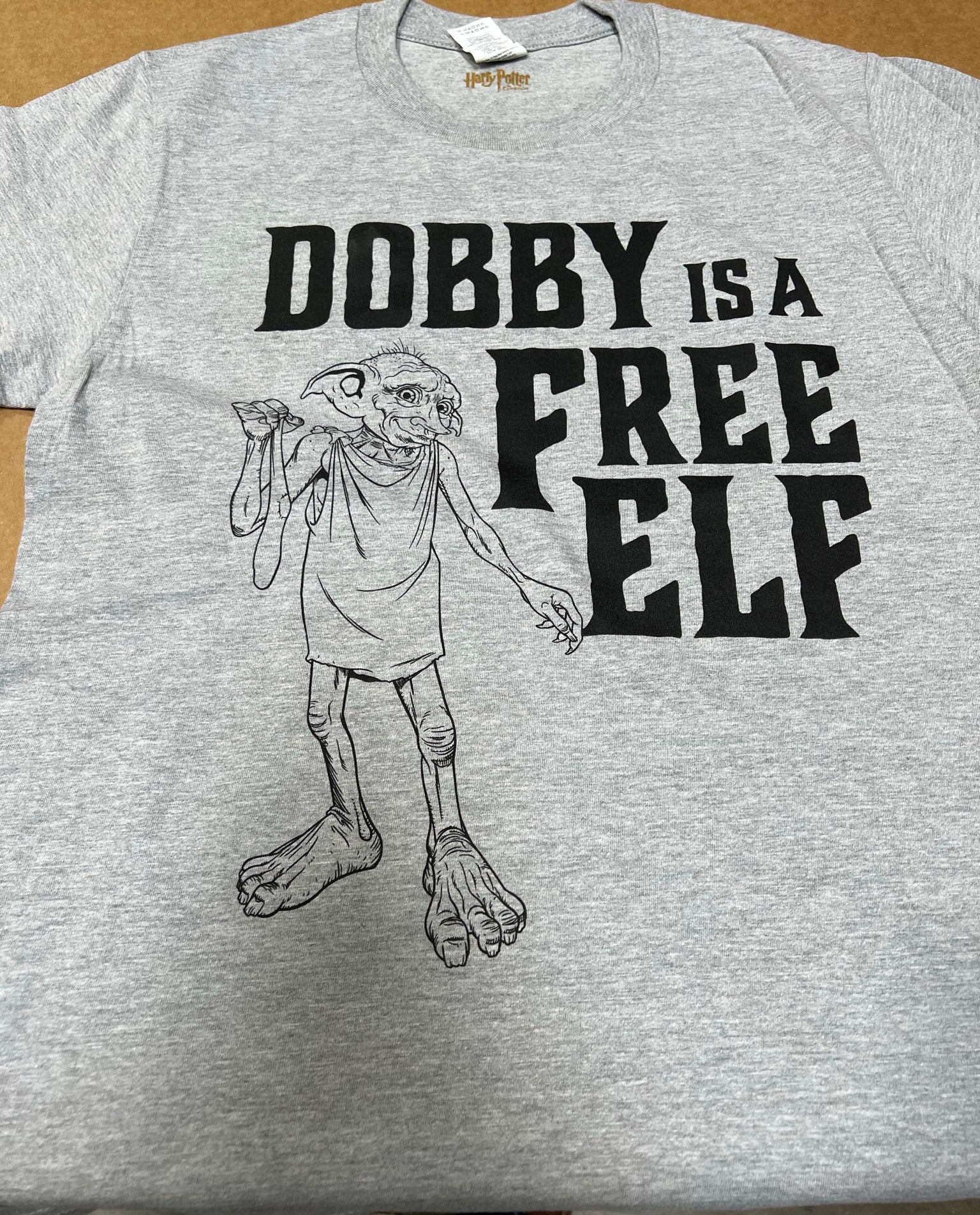 Dobby is Se and (from the CineConcerts t-shirt Potter – elf\